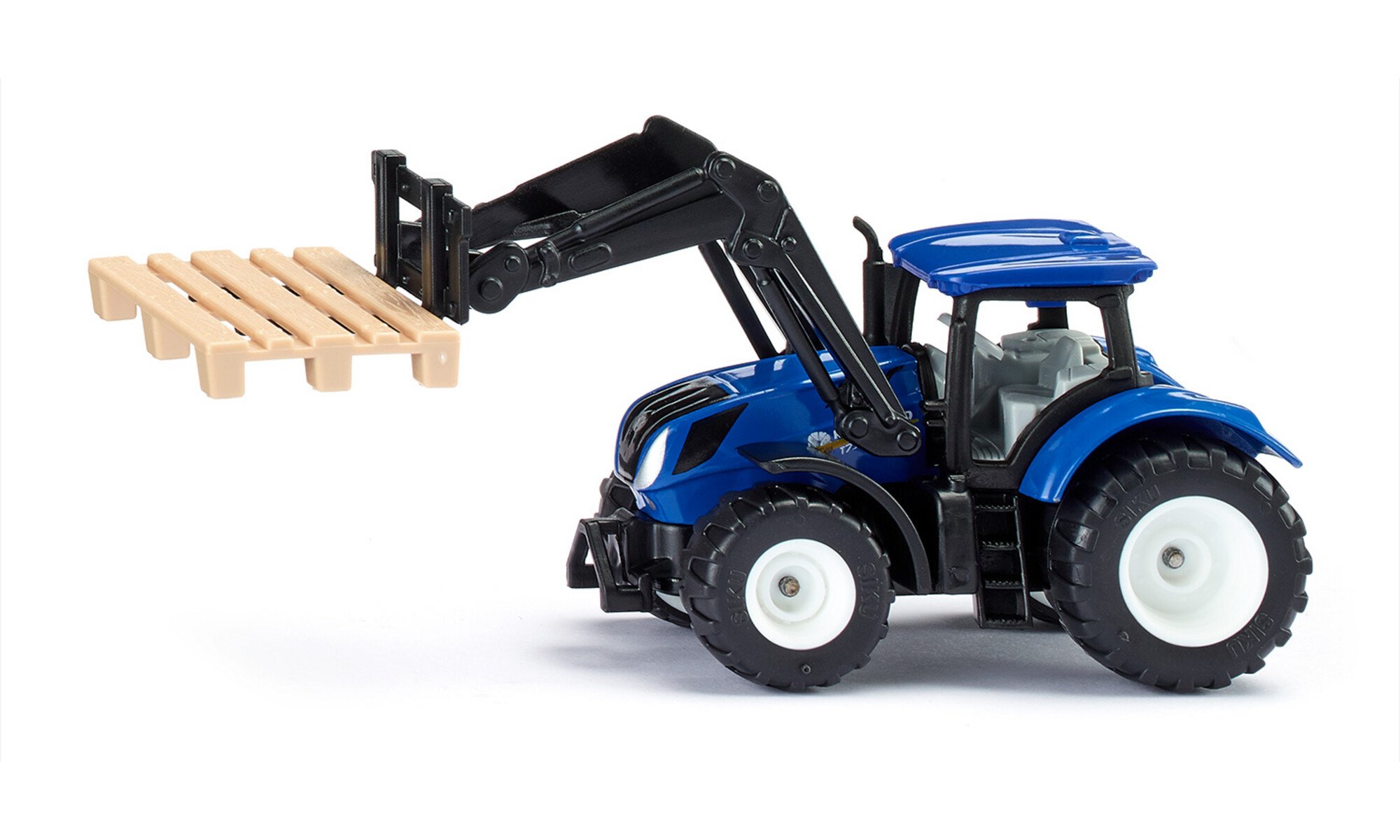 New Holland avec fourche de palettes et palette inclue